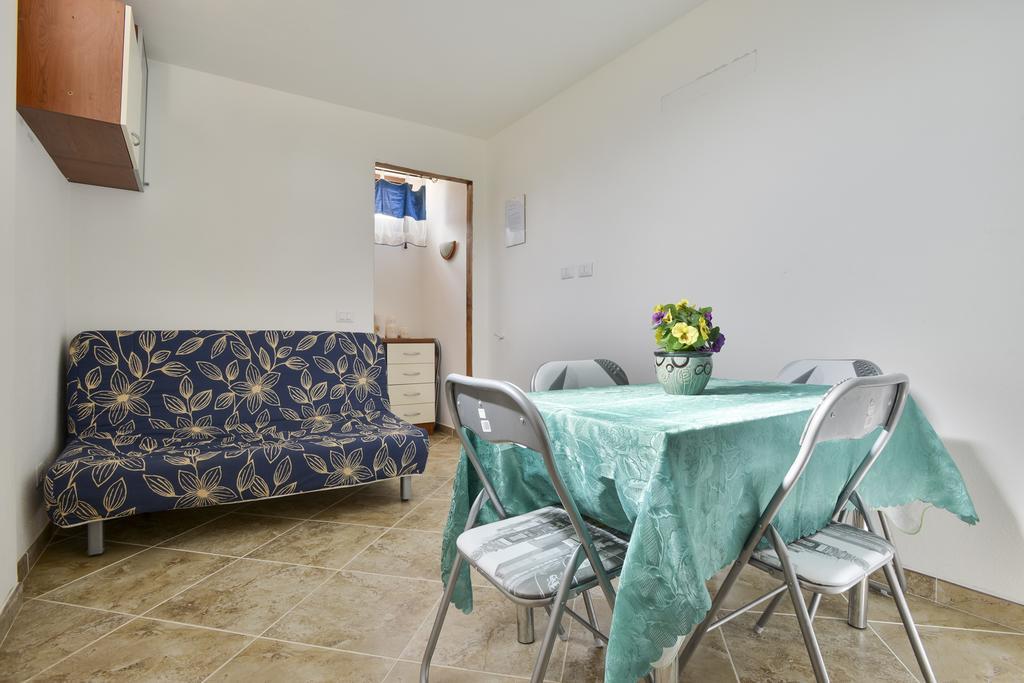 Appartamento Le Palme Alguer Habitación foto