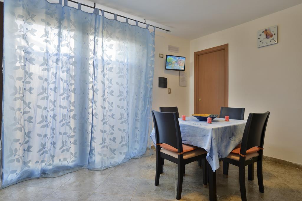 Appartamento Le Palme Alguer Habitación foto